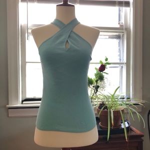 Summer halter style sleeveless shirt in pale teal.